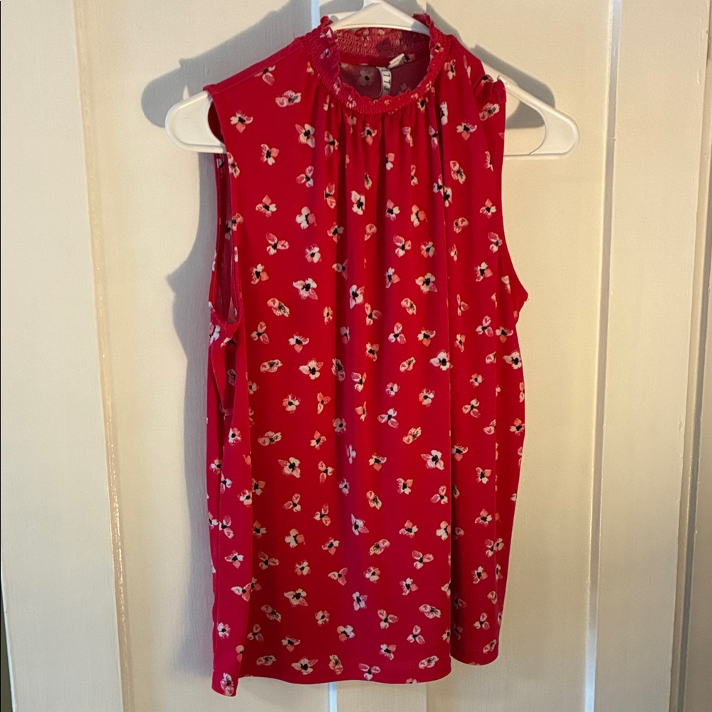 Pink sleeveless blouse